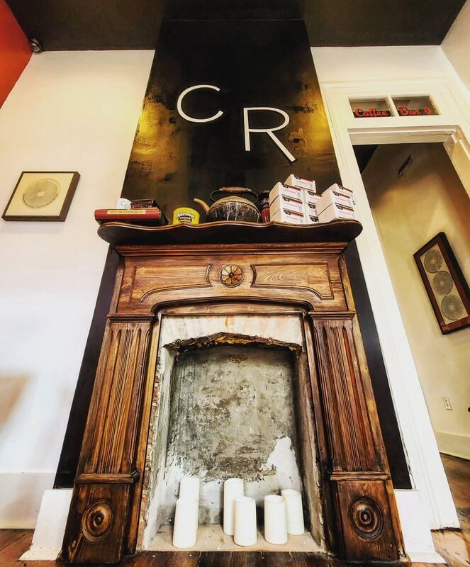 Fireplace seating area at Magazine Street