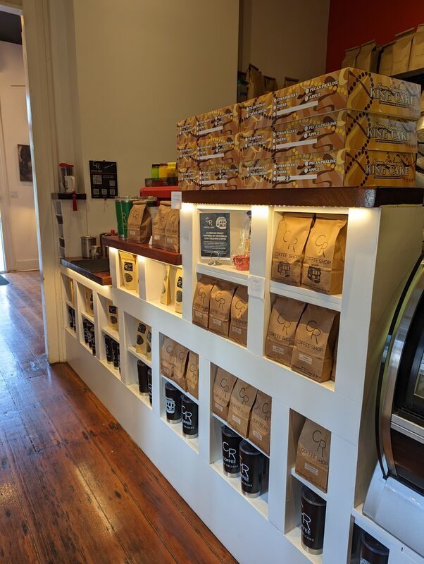 Retail wall with beans and coffee equipment