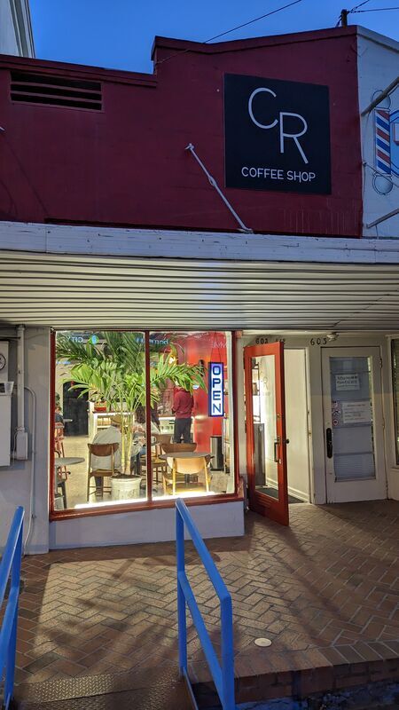 Metairie storefront at dusk