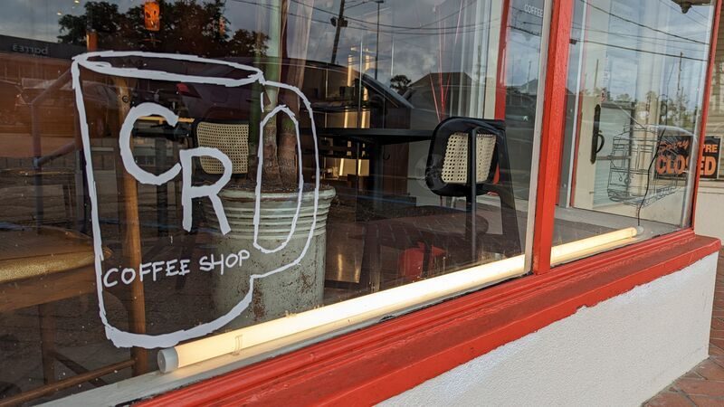 Window art display at CR Coffee Old Metairie