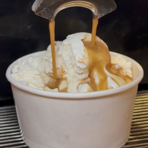 Espresso pouring onto vanilla ice cream from the espresso machine at CR Coffee Shop