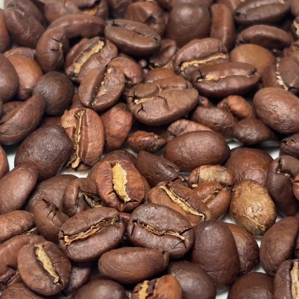 Freshly roasted Coast Roast coffee beans close-up